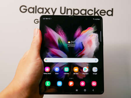 Bangkok, Thailand - August 11, 2021: Samsung officially launches the latest foldable flagship smartphone, the Samsung Galaxy Flip 3.のeditorial素材