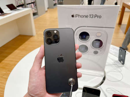 Bangkok, Thailand - October 13, 2021: Hands on iPhone 13 series are shown to sell in iStudio By...