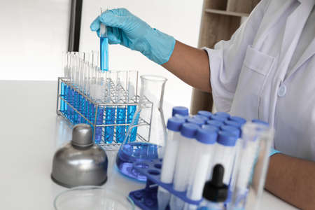 Female scientist are experimenting in the laboratory, science concept, virus, chemical.