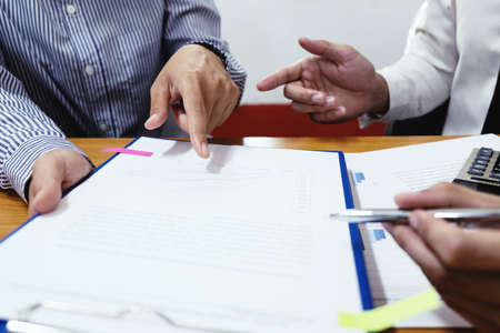 Two businessman are discussing about business growth and planing, business finances and accounting concept. の写真素材
