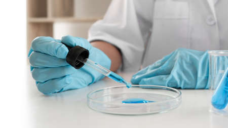 Female scientist are experimenting in the laboratory, science concept, virus, chemical.