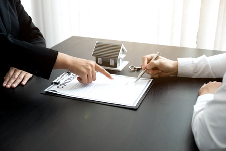 The customer is signing a rental contract for a house, Property concept.の写真素材