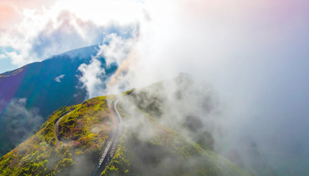 Mountain road in the clouds. Carpathians, Ukraine, Europe.の素材
