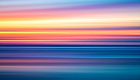 Abstract motion blur background. Colorful sunset on the sea. Long exposure.の素材