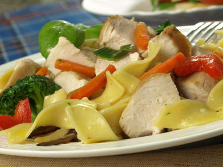 Lunch meal with pasta,chicken and vegetablesの写真素材