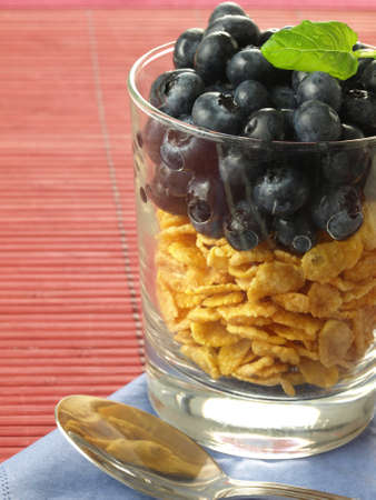 Crunchy cornflakes with ripe blueberries