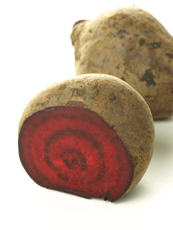 Cut red beetroot to prepare on isolated backgroundの写真素材
