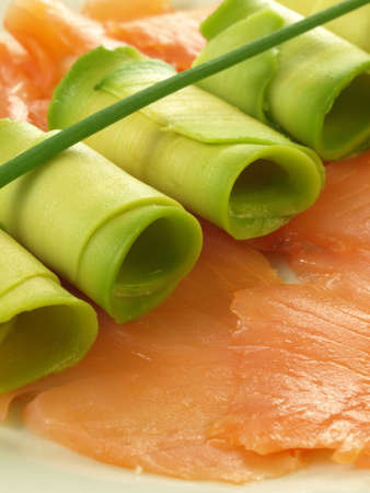Closeup of salmon and avocado slices, verticalの写真素材