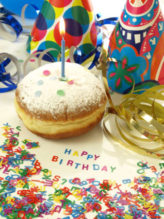 Birthday suprise: donut, streamer and confettiの写真素材