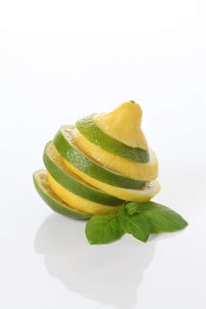 Slices citrus: lemon, lime on isolated backgroundの写真素材