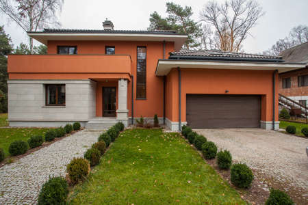 Travertine house - facade of modern house, horizontal view Travertine house - facade of modern house, horizontal view