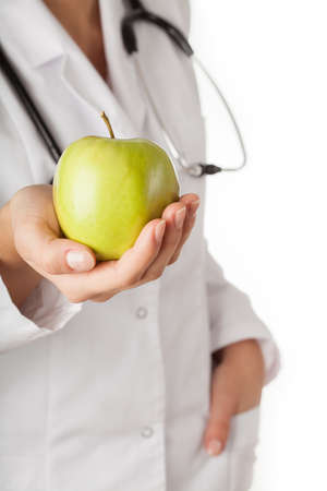 Big green apple in doctorの写真素材