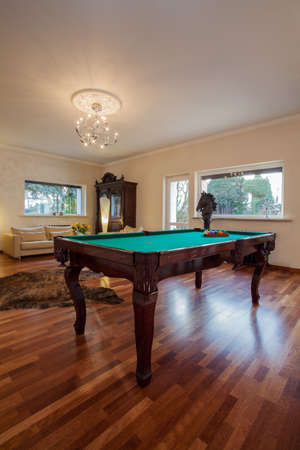 Cloudy home - classic billiard table in stylish house