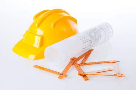 Architect helmet, measure and plan, isolated backgroundの写真素材