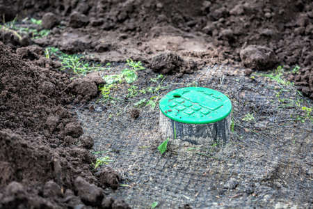 Installation of sprinkle in a garden 