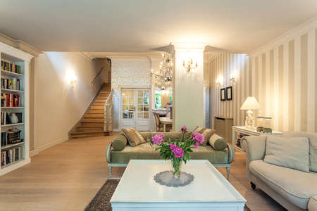 Vintage mansion - a spacious classy living room in beigeのeditorial素材