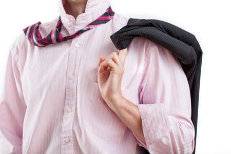 Employee after work with jacket on his shoulderの写真素材