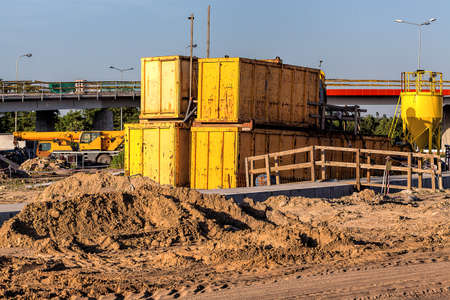Yellow containers on a building siteの写真素材