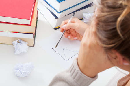 Math student having learning difficulties in taskの写真素材