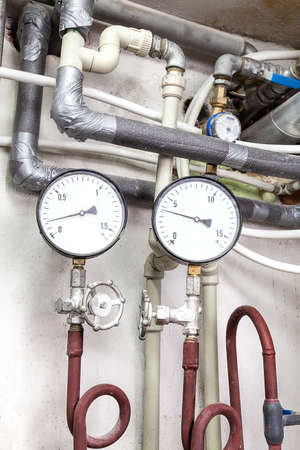 Closeup of a counters of a heating pipes system