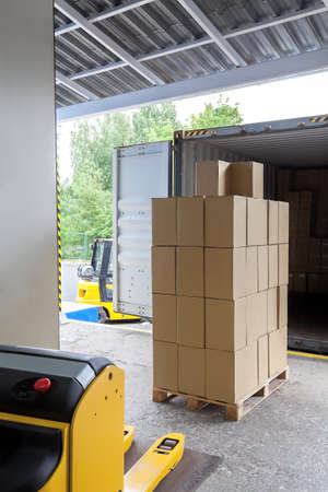 Loading in a warehouse with help of forklift