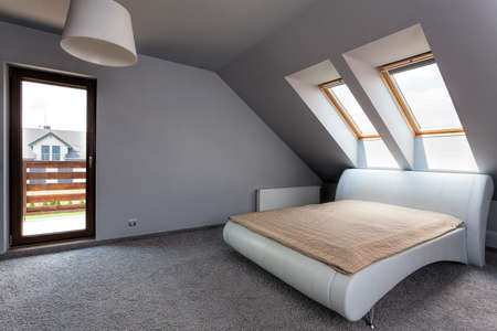 Urban apartment - modern bedroom on the attic