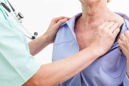 A doctor doing a check-up of his patient's body