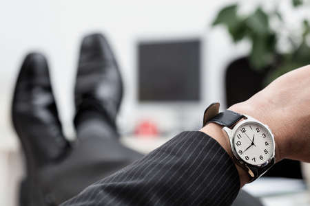 A close up of a businessman's elegant watch
