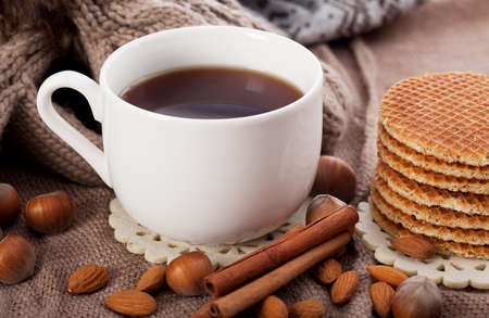 Closeup of a winter flavour, cinnamon nuts and cookiesの写真素材