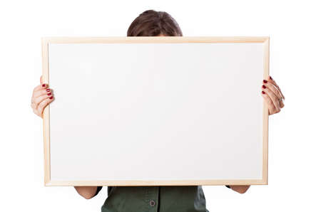 A woman holding a white board as space for your own text