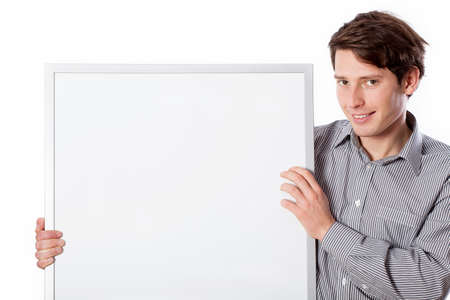 A smiling man holding a white board for your own text
