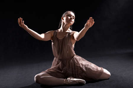 Ballet dancer acting in play on a stage.の写真素材