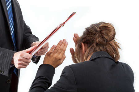 Briefcase hitting worker - an example of mobbing