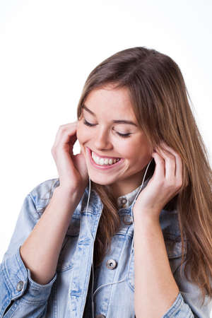 Teenager is happy because of listening good musicの写真素材