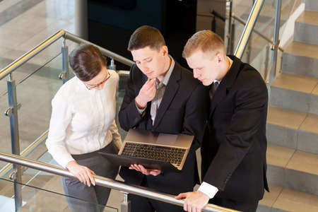 Business people with laptop at the office building