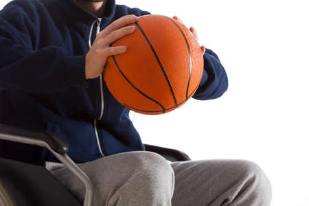 Close-up of disabled man throwing basketball, horizontalの写真素材