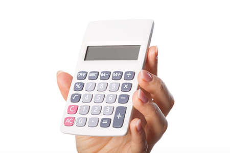 Woman's hand holding new modern small calculator