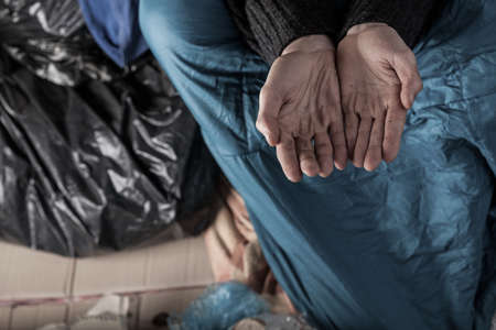 Homeless man needs money for a livingの写真素材