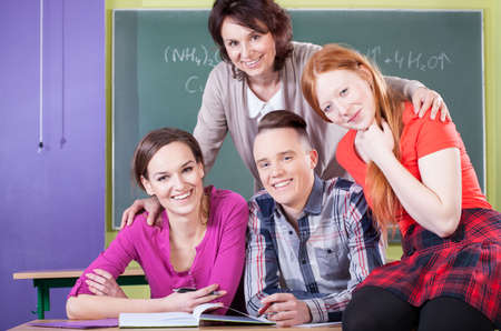 Students and teacher during chemistry lesson, horizontalの写真素材