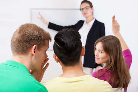 Student gossip about the nerd girl in the class