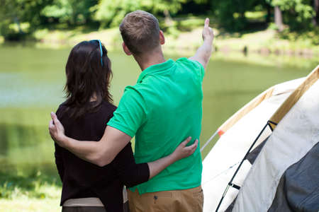 Couple in love on a camping, horizontalの写真素材