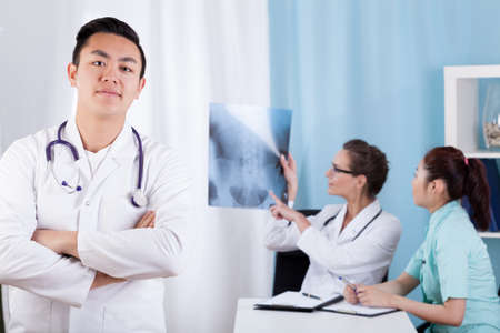 Horizontal view of ethnic diversity in medical teamの写真素材