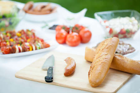 Fresh tasty barbecue dishes before grilling timeの写真素材