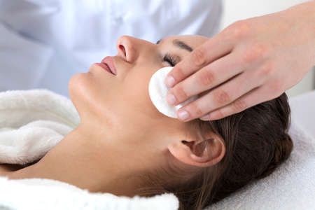 Close-up of woman during facial cleansing in spaの写真素材