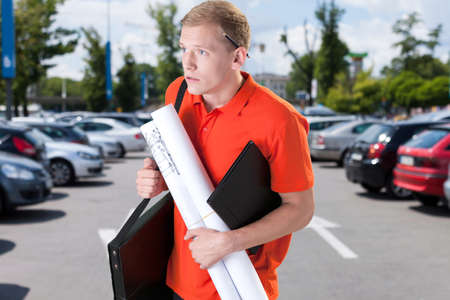 Young and scared architect before work, horizontalの写真素材