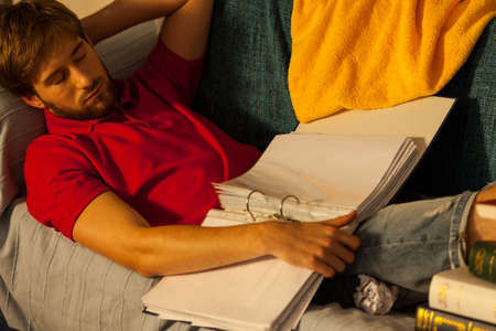 Student is too sleepy for learning, horizontalの写真素材