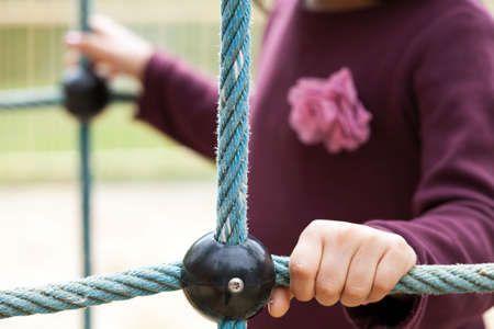 Close-up of girl on a playground, horizontalの写真素材