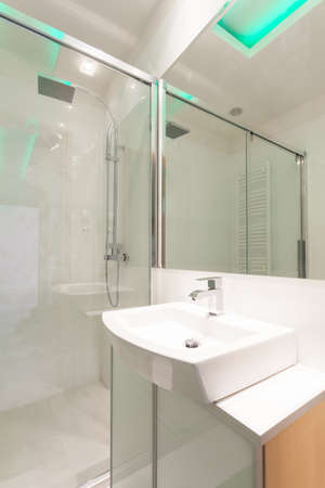 View of porcelain sink in modern bathroomの写真素材