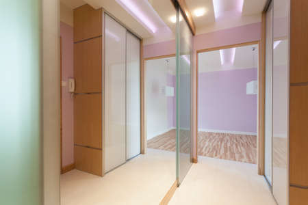 Anteroom with big mirror in modern apartmentの写真素材
