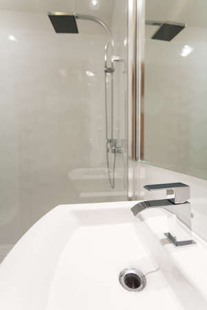 View of white sink in modern bathroomの写真素材